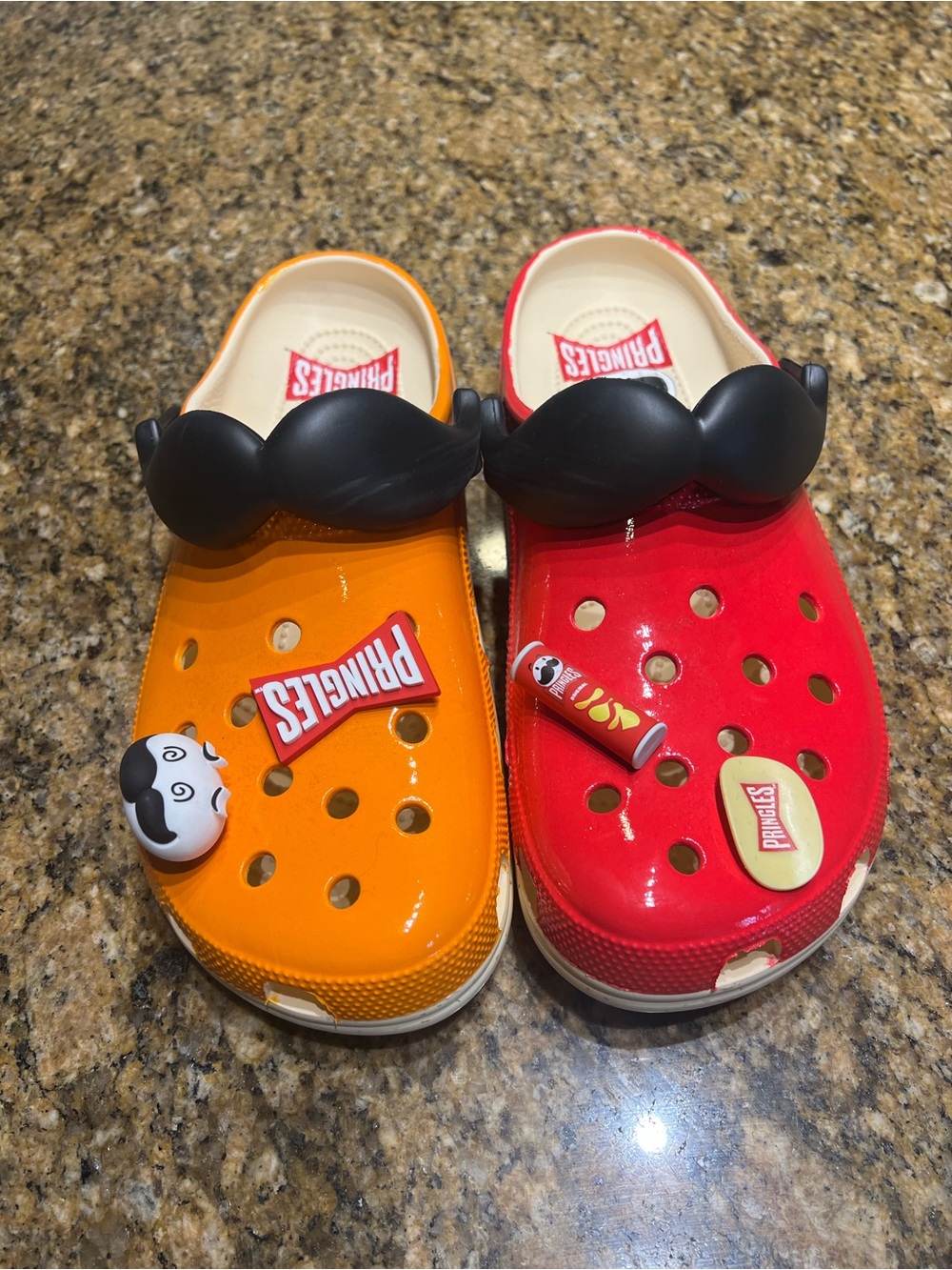 Crocs Pringle men’s Clog Pair in Orange and Red with Black Accent